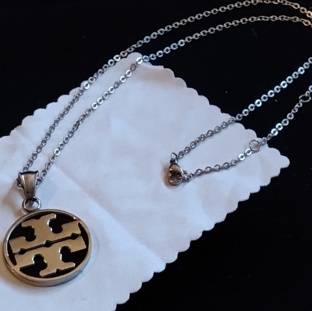 Silver and Black Tory Burch Pendant Necklace